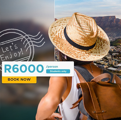 Student with summer hat and day backpack looking at Table Mountain and Cape Town in the background